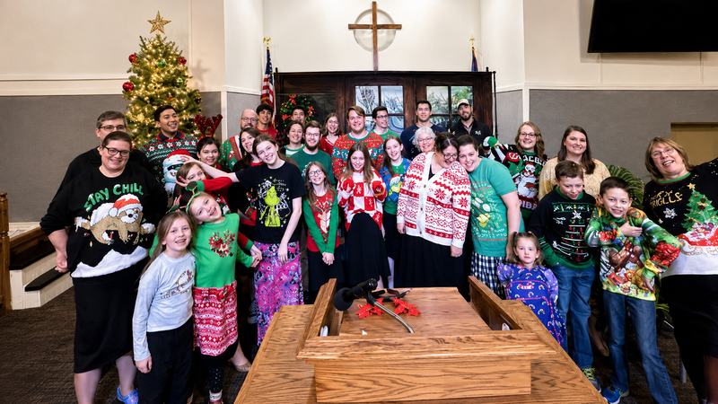 Church family gathered for a Christmas celebration